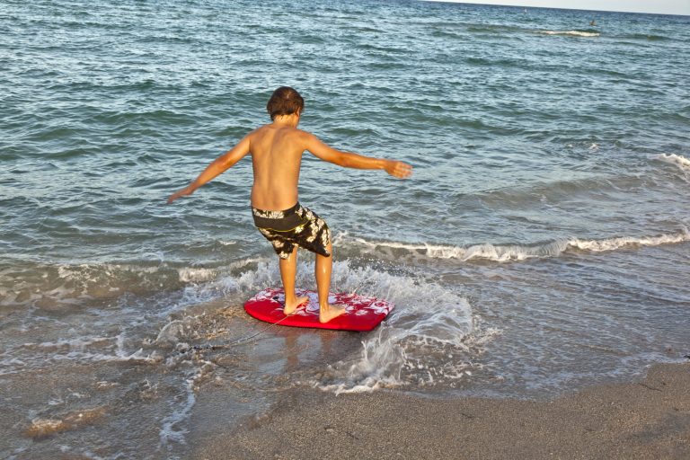 Learning to ride skimboard