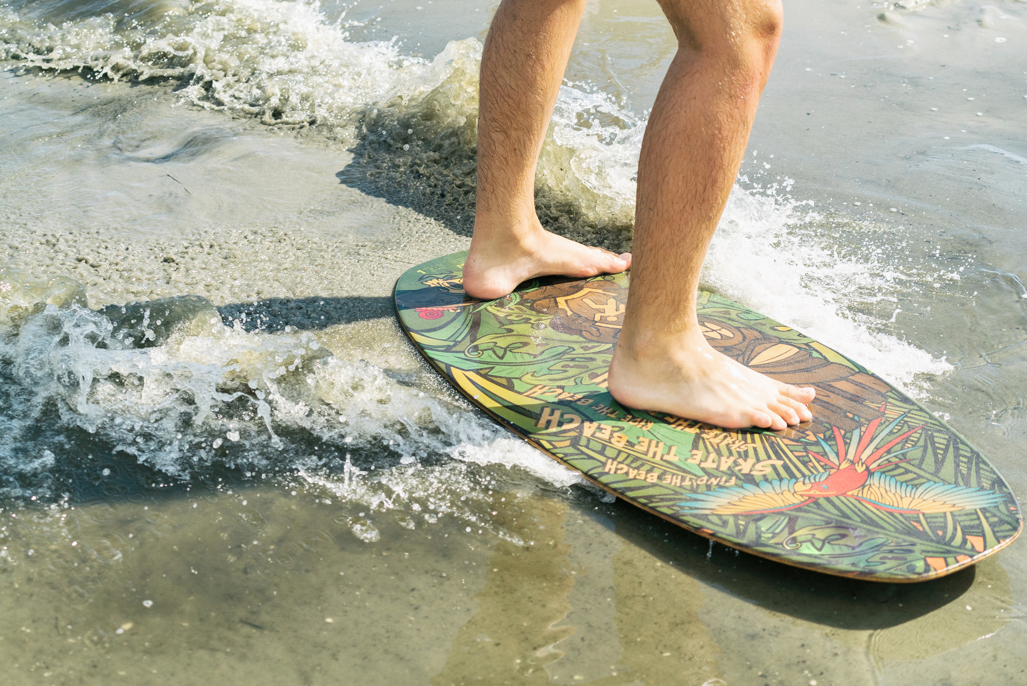 Skimboarding at the shore